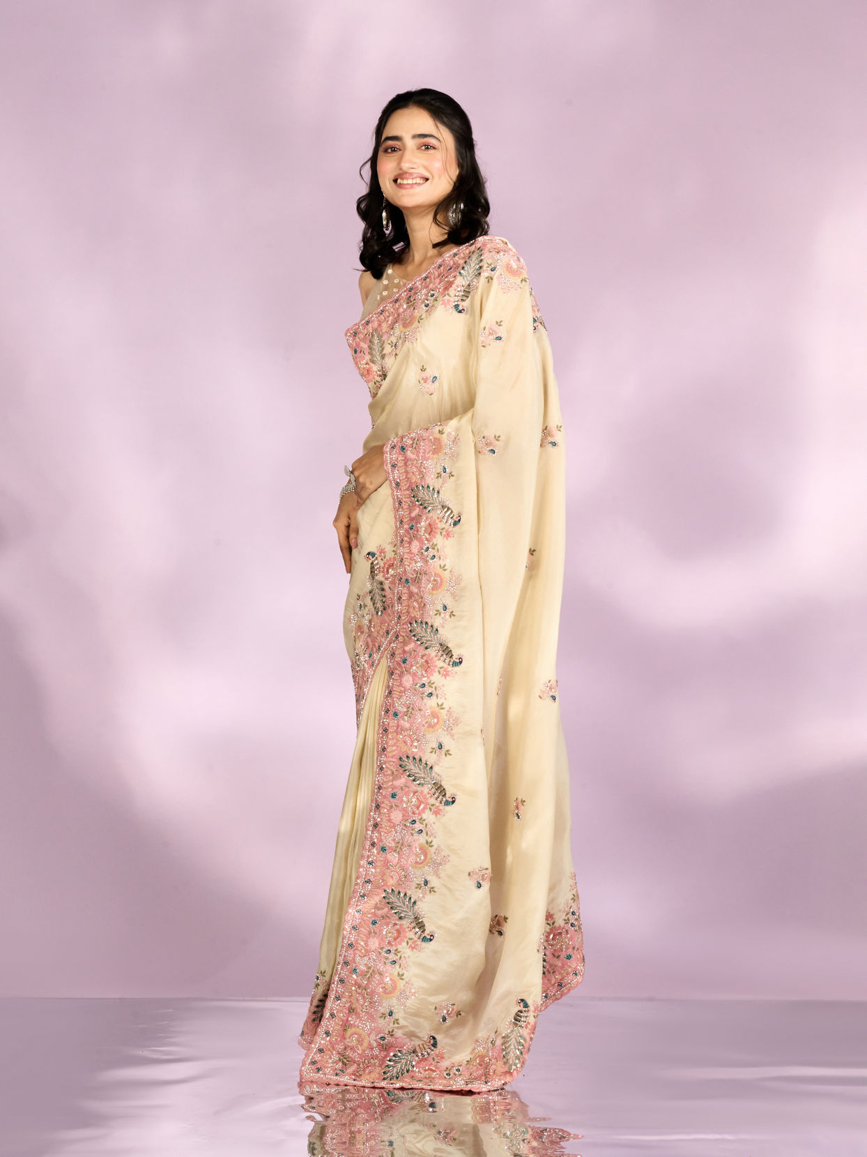 Mohey Women Enthralling Cream Organza Saree