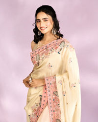 Mohey Women Enthralling Cream Organza Saree