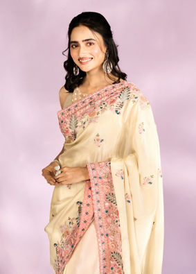 Mohey Women Enthralling Cream Organza Saree
