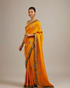 Mohey Women Mustard Yellow Buta Embroidered Saree with Intricate Borders And Rhinestone Work