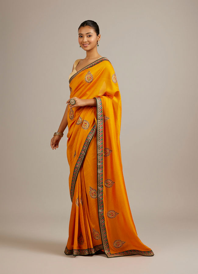 Mohey Women Mustard Yellow Buta Embroidered Saree with Intricate Borders And Rhinestone Work