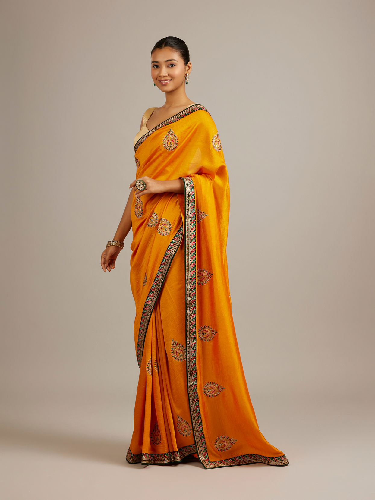 Mohey Women Mustard Yellow Buta Embroidered Saree with Intricate Borders And Rhinestone Work