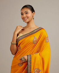 Mohey Women Mustard Yellow Buta Embroidered Saree with Intricate Borders And Rhinestone Work