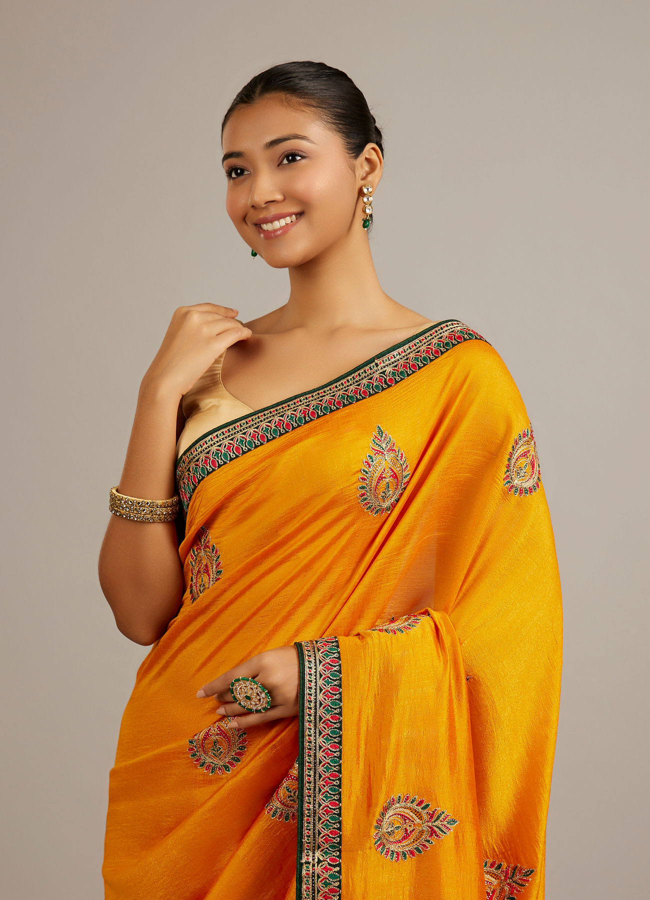 Mohey Women Mustard Yellow Buta Embroidered Saree with Intricate Borders And Rhinestone Work