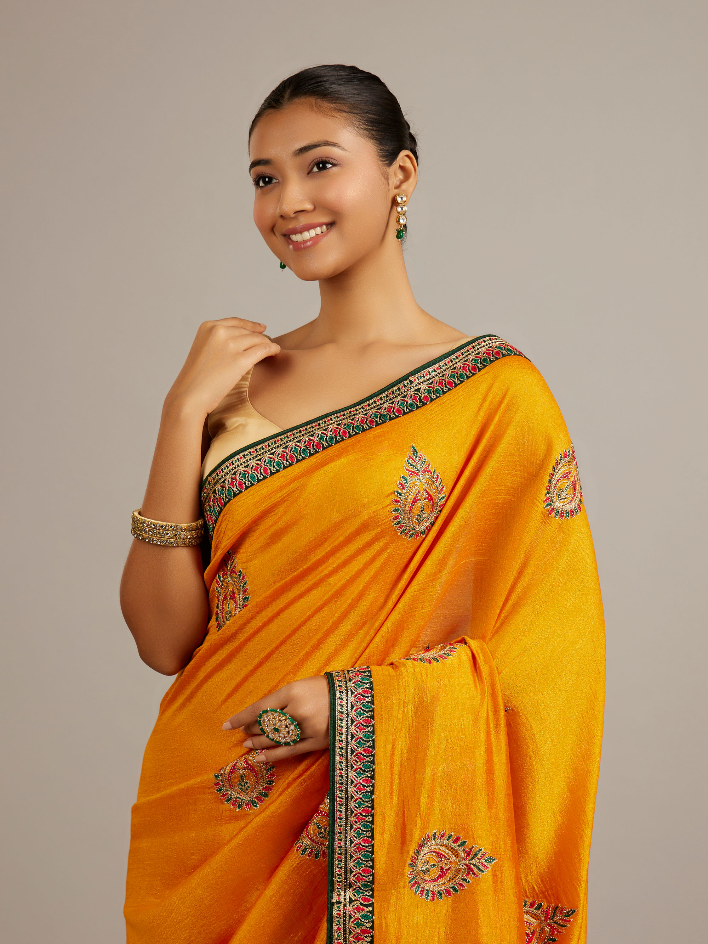 Mohey Women Mustard Yellow Buta Embroidered Saree with Intricate Borders And Rhinestone Work