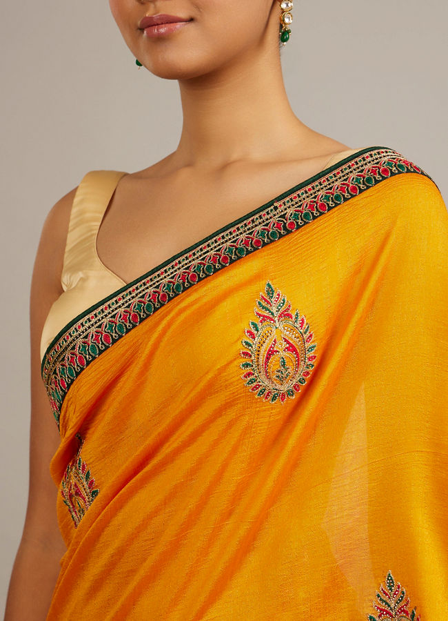 Mohey Women Mustard Yellow Buta Embroidered Saree with Intricate Borders And Rhinestone Work