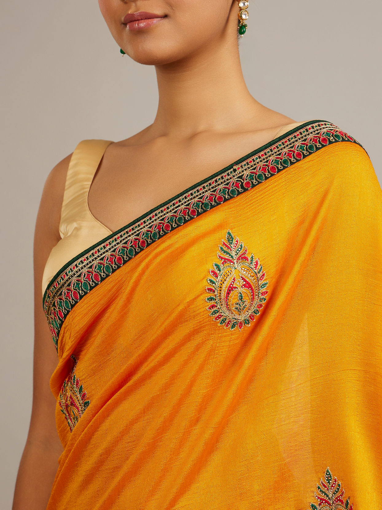 Mohey Women Mustard Yellow Buta Embroidered Saree with Intricate Borders And Rhinestone Work