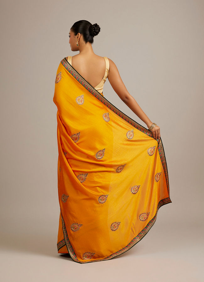 Mohey Women Mustard Yellow Buta Embroidered Saree with Intricate Borders And Rhinestone Work