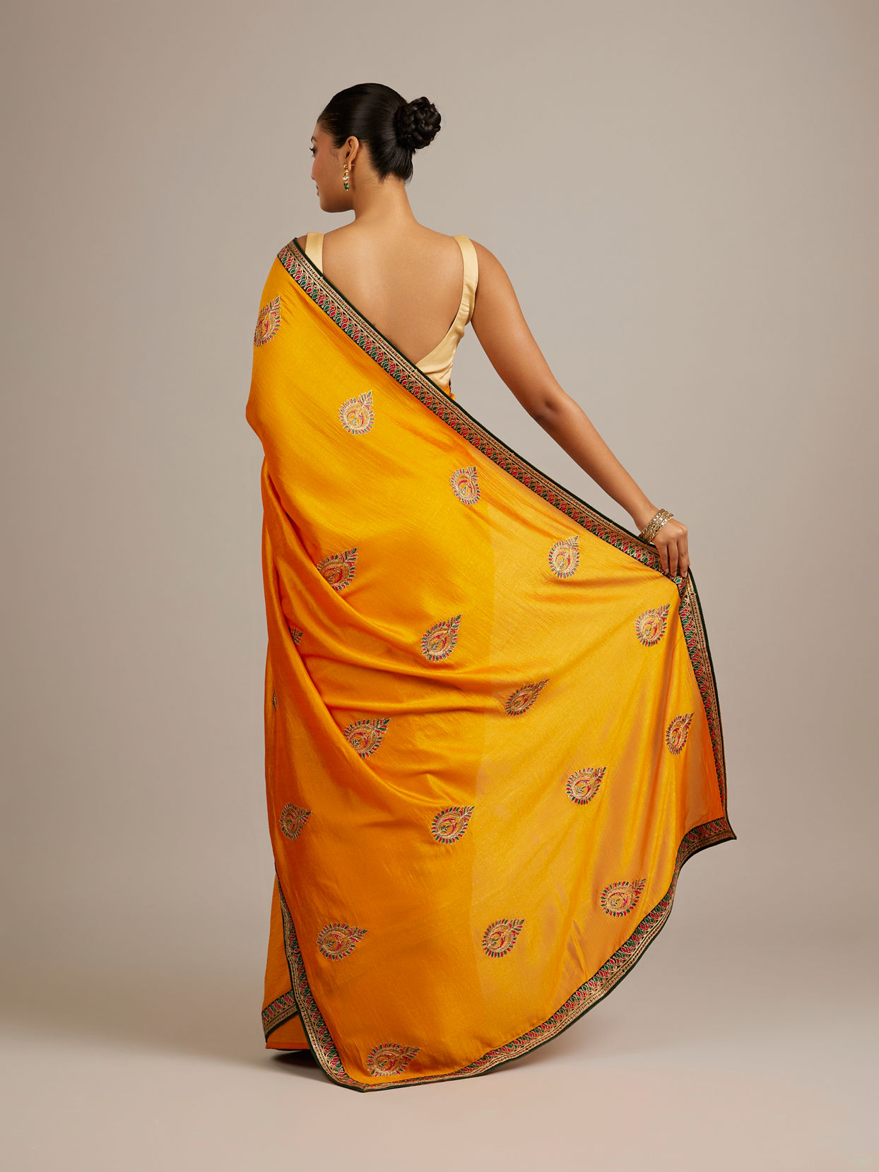 Mohey Women Mustard Yellow Buta Embroidered Saree with Intricate Borders And Rhinestone Work