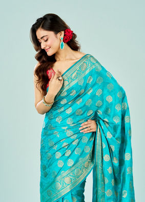 Mohey Women Ravishing Rama Green Saree