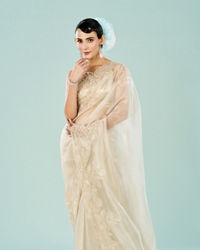 Mohey Women Cream Colored Vision of Elegance Saree