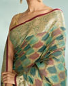 Mohey Women Enchanting Rama Green Saree