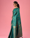 Mohey Women Elegance Embodied Rama Green Saree