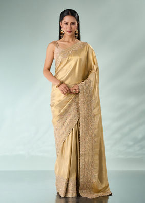 Mohey Women Cream Silk Saree with Cutdana and Sequin Work