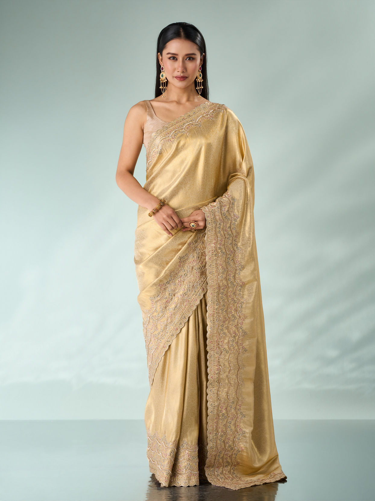 Mohey Women Cream Silk Saree with Cutdana and Sequin Work