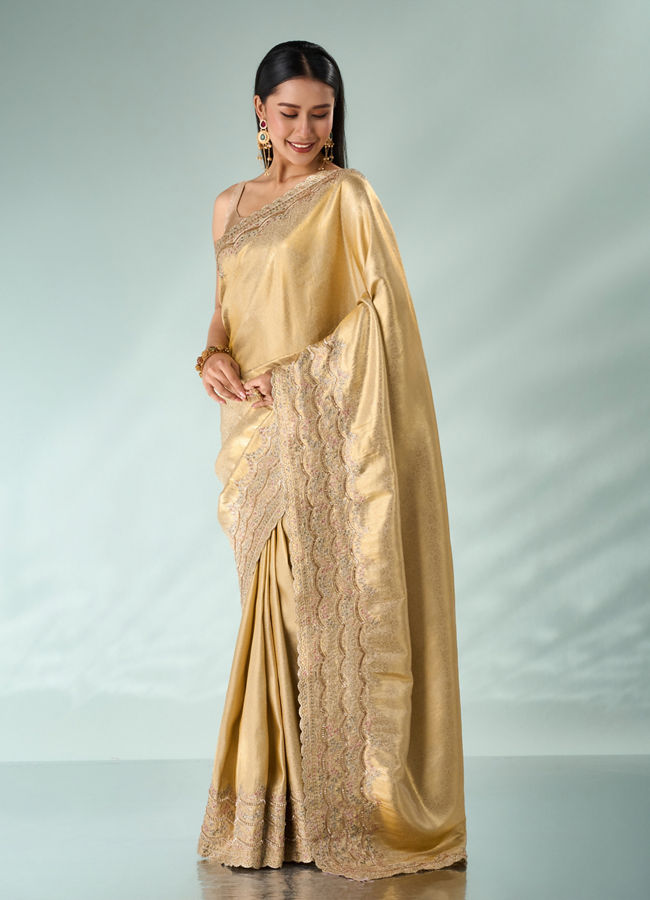 Mohey Women Cream Silk Saree with Cutdana and Sequin Work