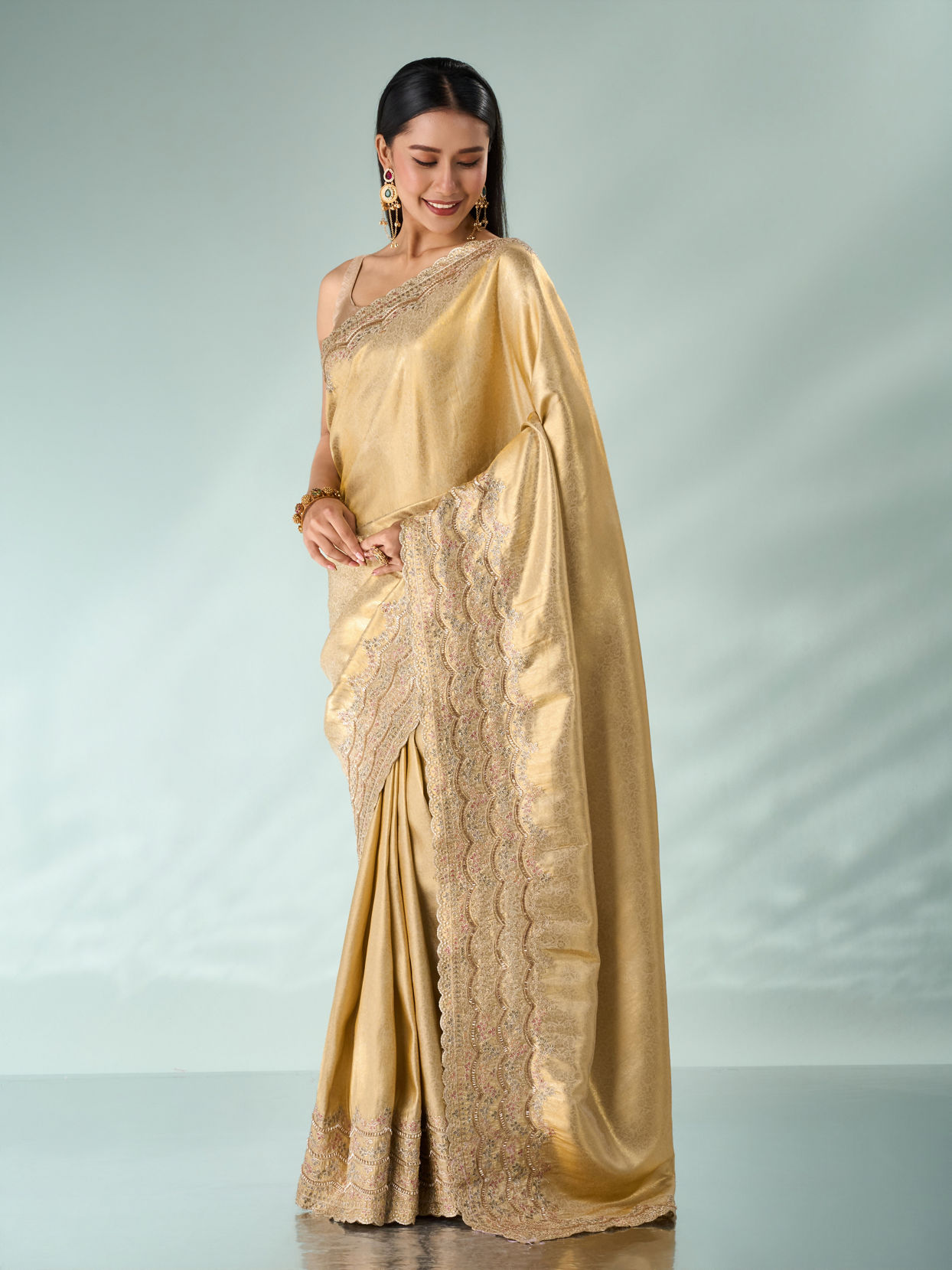 Mohey Women Cream Silk Saree with Cutdana and Sequin Work