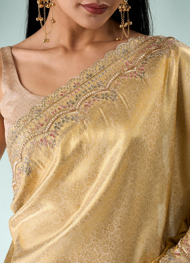 Mohey Women Cream Silk Saree with Cutdana and Sequin Work