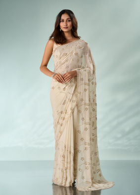 Mohey Women Cream Chiffon Saree with Cutdana Work