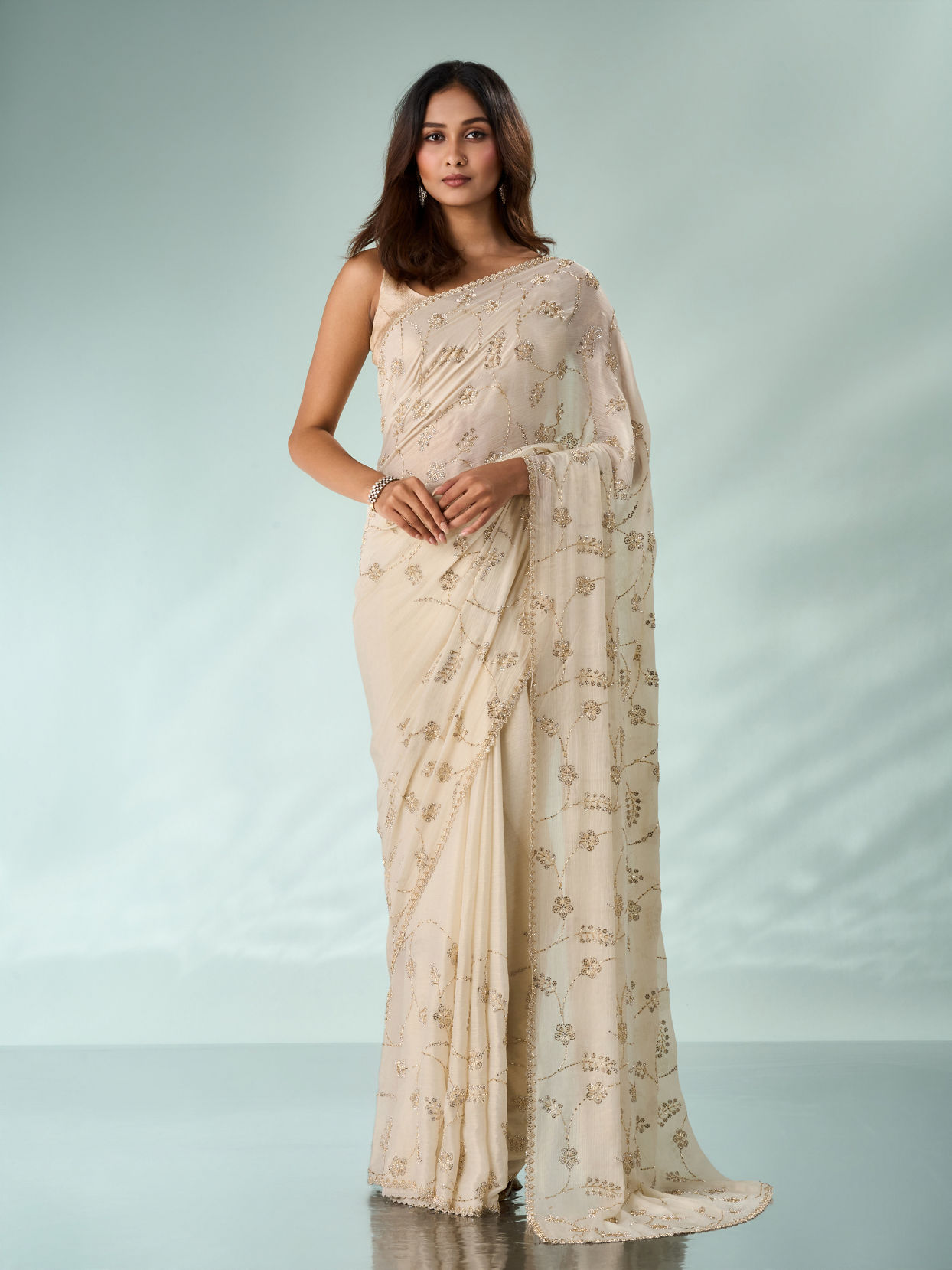 Mohey Women Cream Chiffon Saree with Cutdana Work