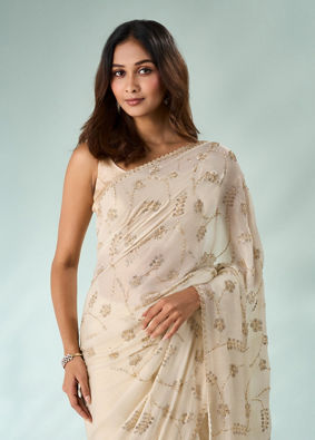 Mohey Women Cream Chiffon Saree with Cutdana Work