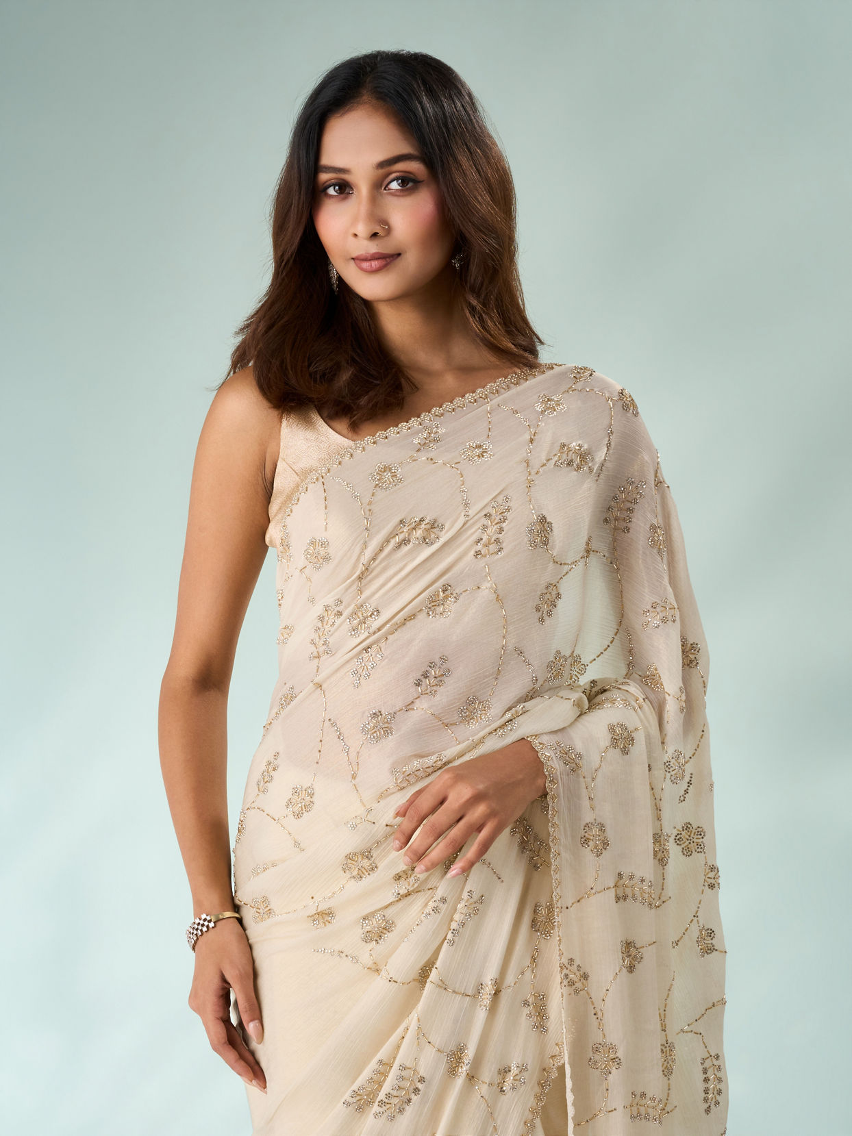 Mohey Women Cream Chiffon Saree with Cutdana Work