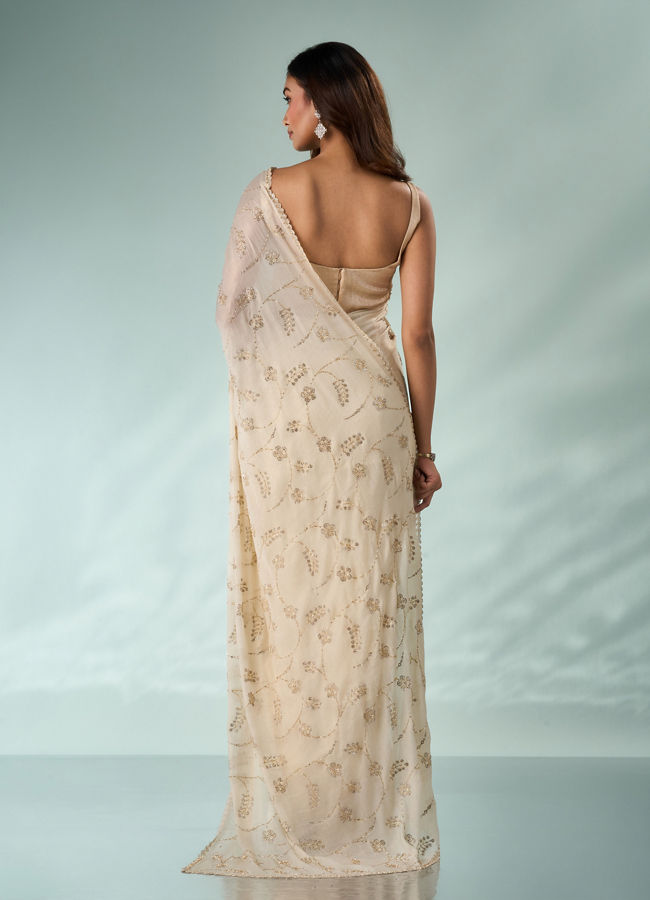 Mohey Women Cream Chiffon Saree with Cutdana Work