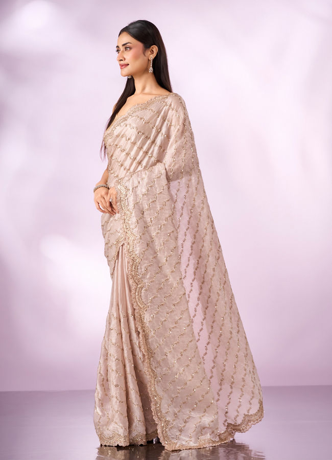 Mohey Women Cream Organza Saree with Cutdana Work