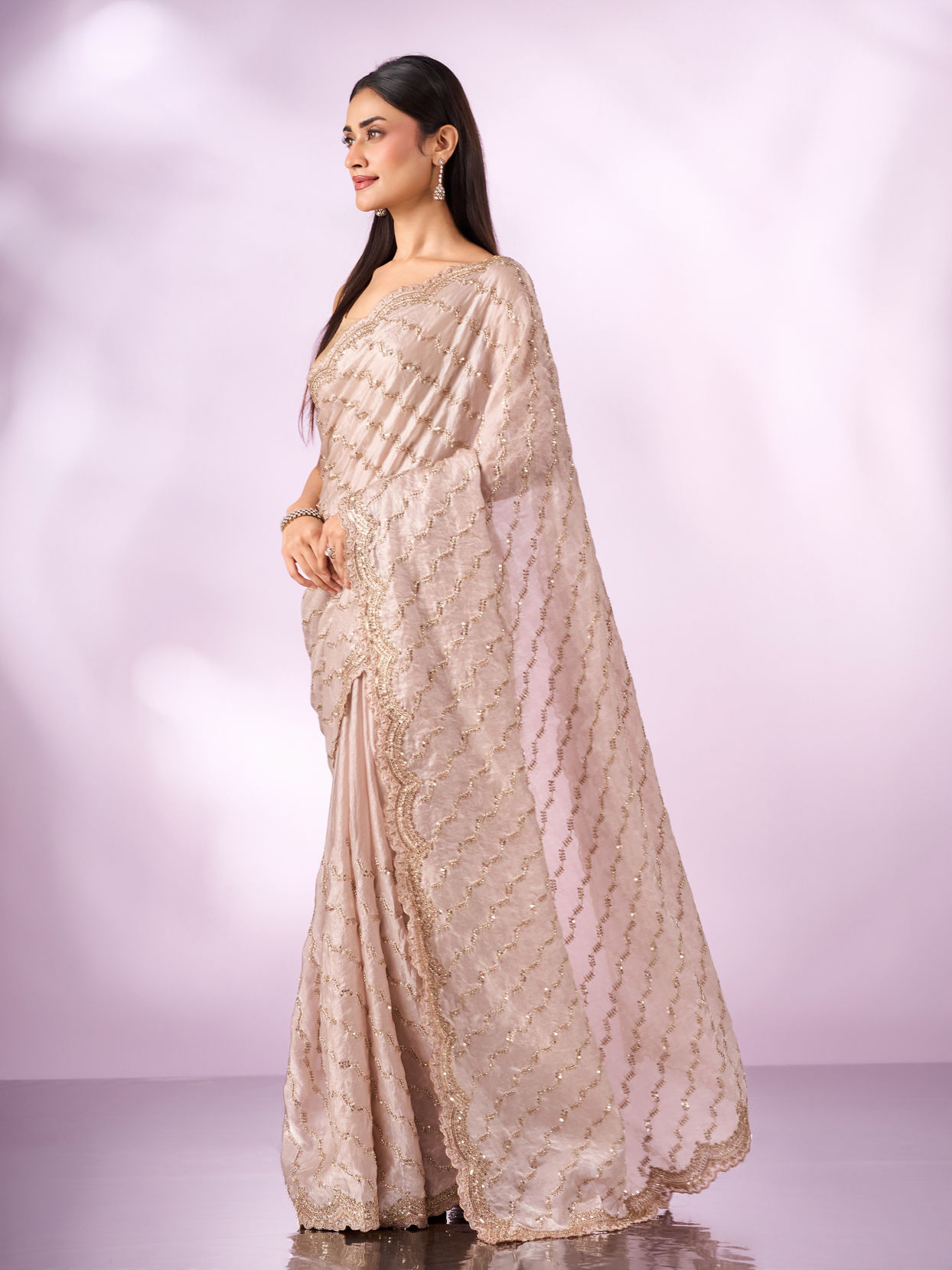 Mohey Women Cream Organza Saree with Cutdana Work
