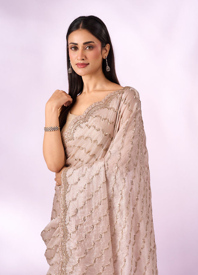Mohey Women Cream Organza Saree with Cutdana Work