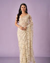 Mohey Women Cream Net Saree with Stone Work