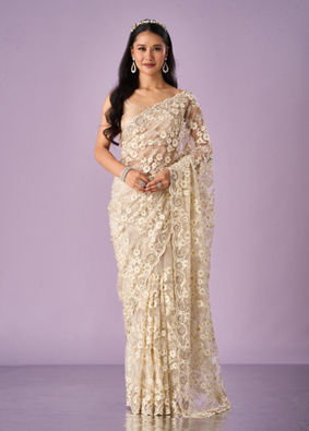 Mohey Women Cream Net Saree with Stone Work