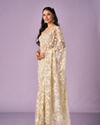 Mohey Women Cream Net Saree with Stone Work