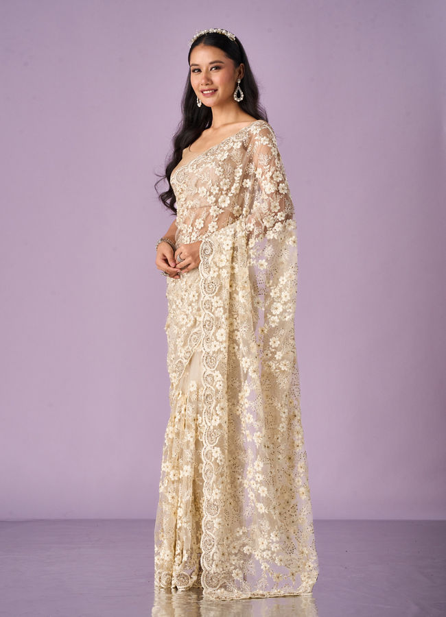 Mohey Women Cream Net Saree with Stone Work