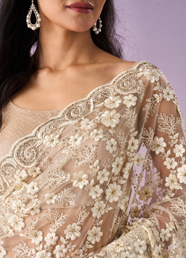 Mohey Women Cream Net Saree with Stone Work