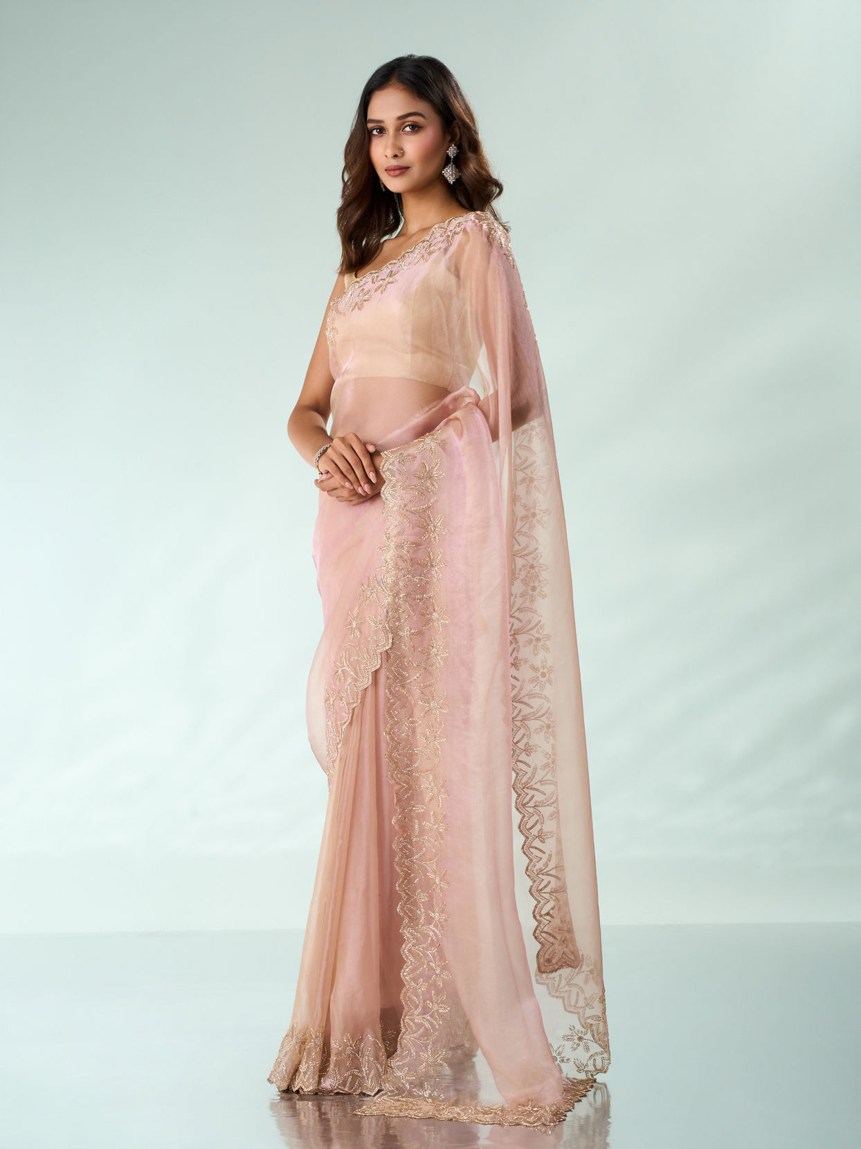 Mohey Women Light Pink Organza Saree with Cutdana Work