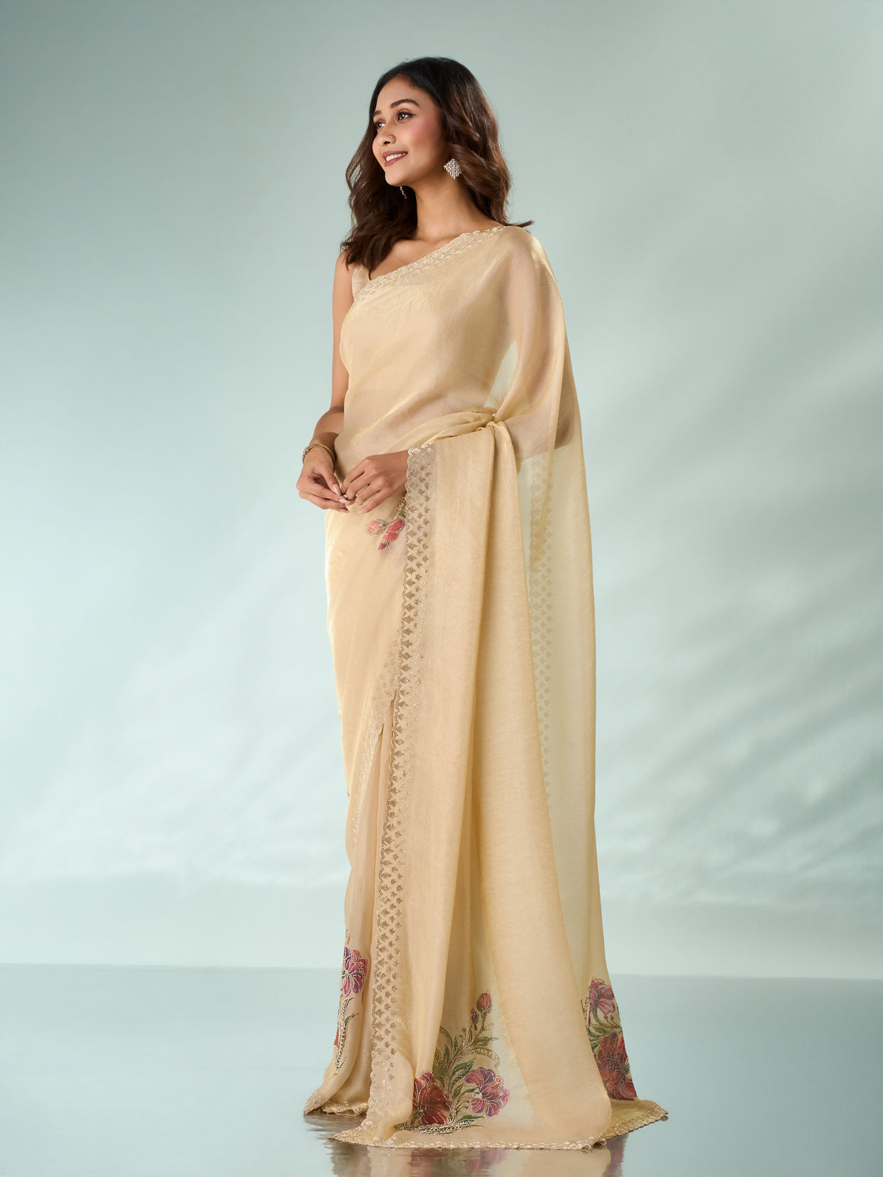 Mohey Women Cream Organza Saree with Print and Stone Work