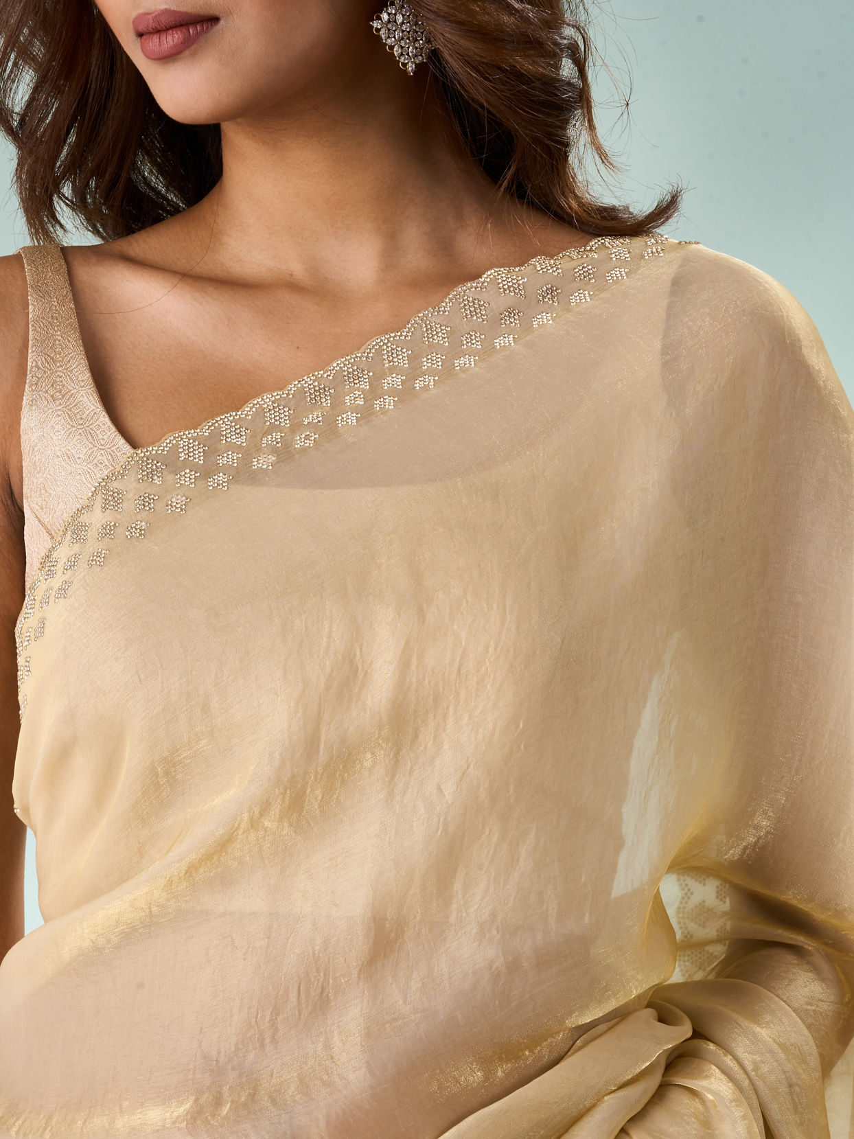 Mohey Women Cream Organza Saree with Print and Stone Work