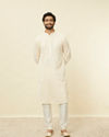 alt message - Manyavar Men Pearled Ivory White Chikankari Kurta Set image number 2