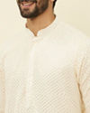 alt message - Manyavar Men Pearled Ivory White Chikankari Kurta Set image number 1