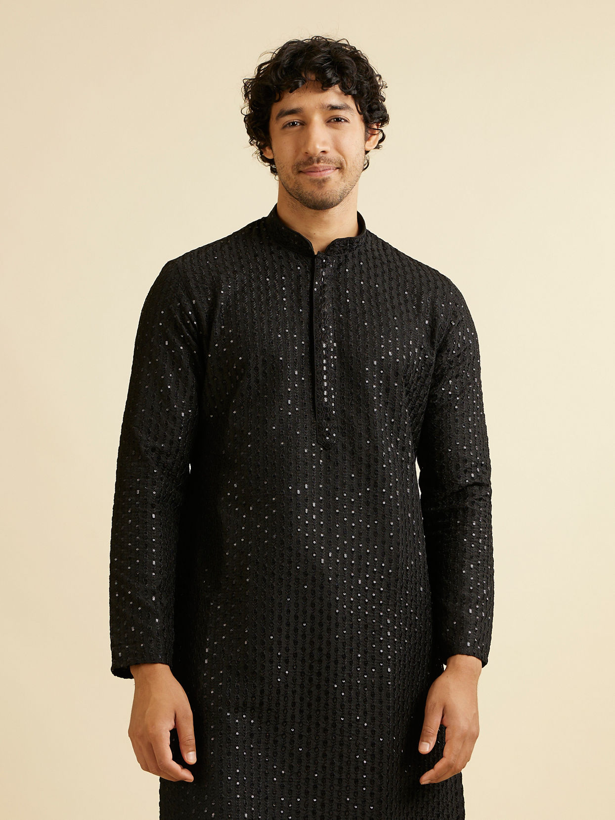 alt message - Manyavar Men Midnight Black Petal String Patterned Kurta Set with Mirror Work image number 0