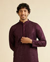 alt message - Manyavar Men Wine Petal String Patterned Kurta Set with Mirror Work image number 0