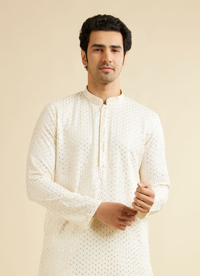 alt message - Manyavar Men Warm White Petal String Patterned Kurta Set with Mirror Work image number 0