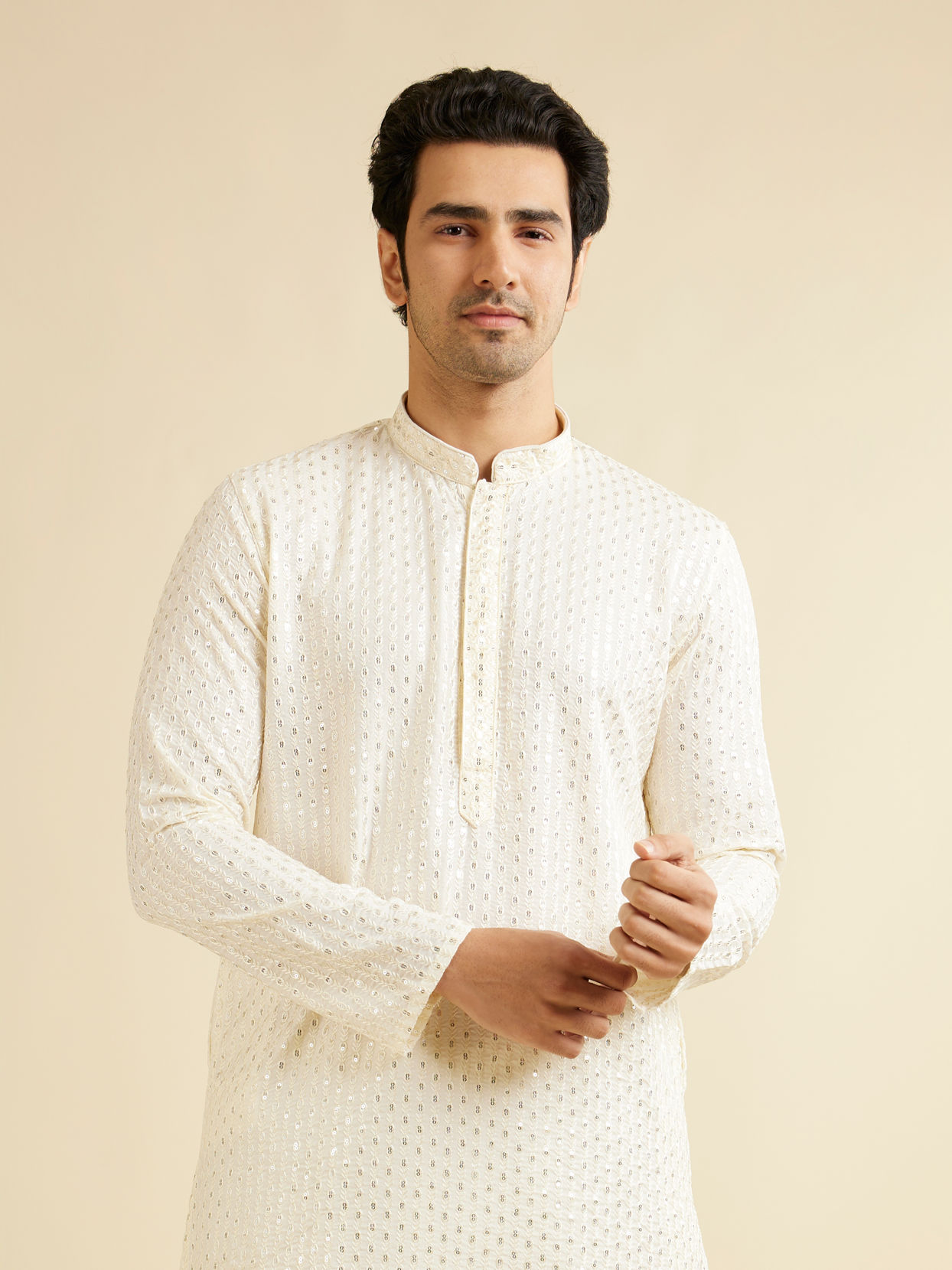 alt message - Manyavar Men Warm White Petal String Patterned Kurta Set with Mirror Work image number 0