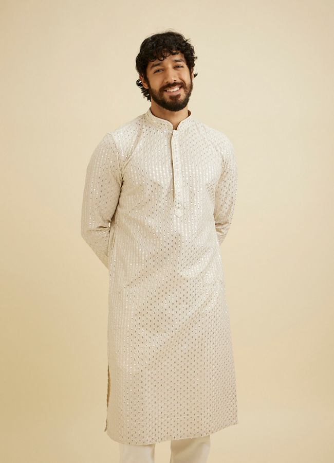 alt message - Manyavar Men Chalk White String Patterned Kurta Set with Mirror Work image number 0