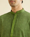 alt message - Manyavar Men Soft Green Bel Buti Patterned Kurta Set image number 1