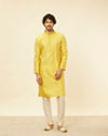 alt message - Manyavar Men Illuminating Yellow Bel Buti Patterned Kurta Set image number 2