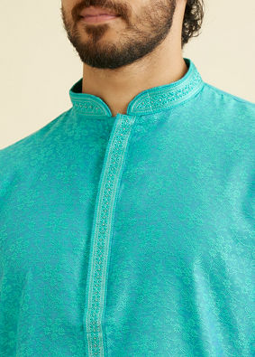 alt message - Manyavar Men Turquoise Blue Bel Buti Patterned Kurta Set image number 1