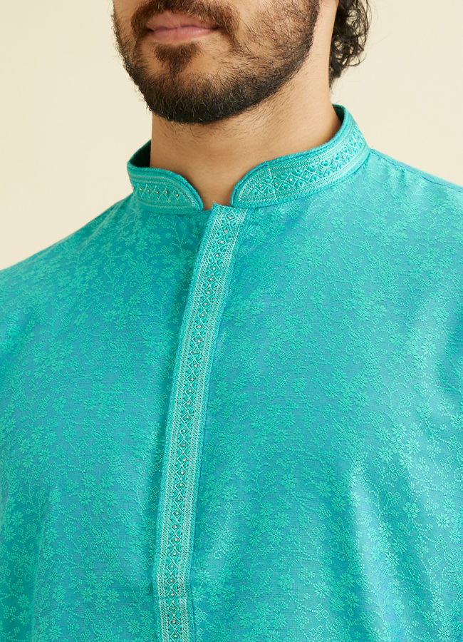 alt message - Manyavar Men Turquoise Blue Bel Buti Patterned Kurta Set image number 1