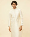 alt message - Manyavar Men Cloud Cream Self Patterned Kurta Set image number 0